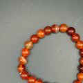Bracelet Cornaline Rubanée perles 8mm